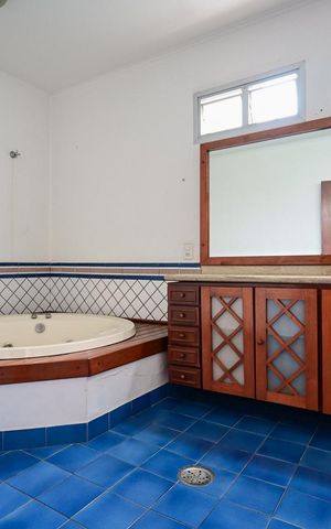 Casa à venda com 850m², 4 quartos e 9 vagasBanheiro Suíte 1