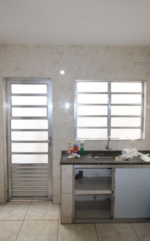 Casa à venda com 210m², 5 quartos e sem vagaSala / Cozinha