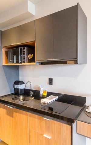 Apartamento à venda com 26m², 1 quarto e 1 vaga Apartamento à venda com 26m², 1 quarto e 1 vagaCozinha