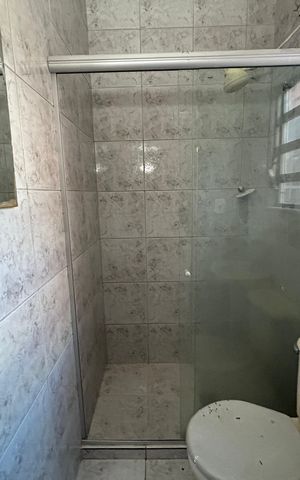 Casa de condomínio à venda com 210m², 3 quartos e 3 vagasBanheiro do Quarto 2 Suíte