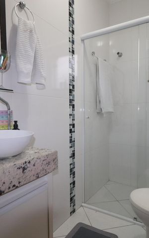 Casa à venda com 151m², 3 quartos e 4 vagasBanheiro Quarto 1 Suíte