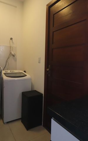 Casa de condomínio à venda com 60m², 2 quartos e 2 vagasLavanderia