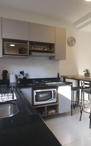 Casa de condomínio à venda com 60m², 2 quartos e 2 vagasCozinha
