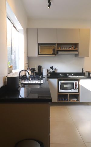 Casa de condomínio à venda com 60m², 2 quartos e 2 vagasLavanderia