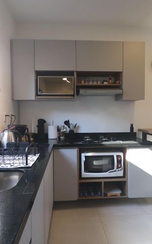 Casa de condomínio à venda com 60m², 2 quartos e 2 vagasCozinha