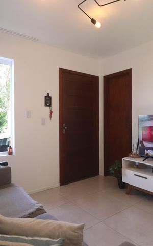 Casa de condomínio à venda com 60m², 2 quartos e 2 vagassala