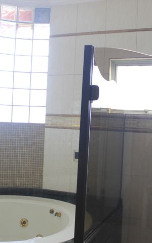 Casa à venda com 247m², 5 quartos e 2 vagasBanheiro da Suíte
