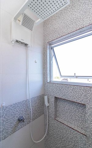 Casa de condomínio para alugar com 100m², 3 quartos e 2 vagas Casa de condomínio para alugar com 100m², 3 quartos e 2 vagasBanheiro da Suíte 2