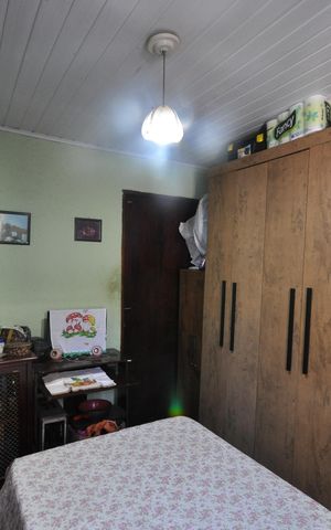 Casa à venda com 68m², 2 quartos e sem vagaQuarto 1