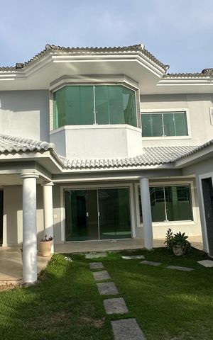Casa de condomínio à venda com 580m², 6 quartos e 4 vagas Casa de condomínio à venda com 580m², 6 quartos e 4 vagasÁrea externa