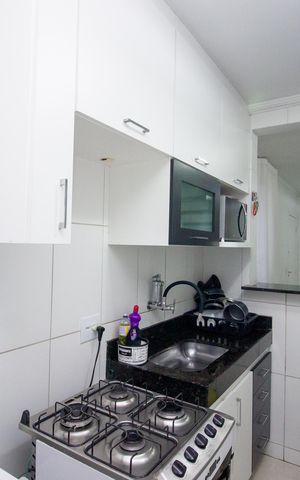 Apartamento à venda com 98m², 2 quartos e 1 vaga Apartamento à venda com 98m², 2 quartos e 1 vagaCozinha e Área de Serviço