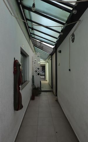 Casa à venda com 115m², 3 quartos e 2 vagasCorredor externo