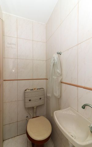Casa de condomínio à venda com 280m², 3 quartos e 2 vagas Casa de condomínio à venda com 280m², 3 quartos e 2 vagasBanheiro de serviço