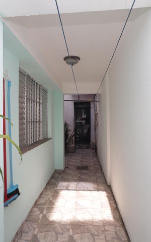 Casa à venda com 250m², 5 quartos e 3 vagasCasa 01 - Corredor externo
