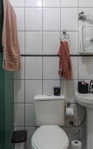 Casa à venda com 125m², 3 quartos e 2 vagas Casa à venda com 125m², 3 quartos e 2 vagasBanheiro da Suíte