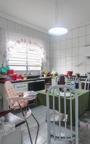Casa à venda com 125m², 3 quartos e 2 vagas Casa à venda com 125m², 3 quartos e 2 vagasCozinha