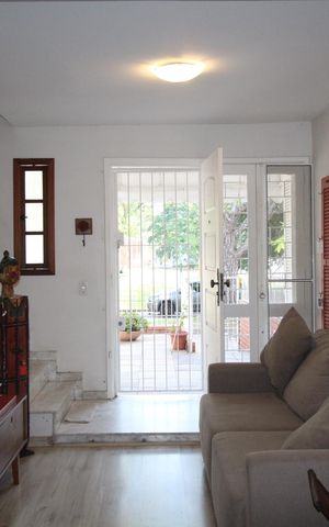 Casa de condomínio à venda com 126m², 3 quartos e 2 vagasSala