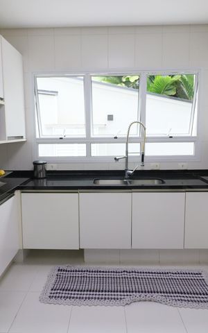 Casa de condomínio à venda com 750m², 4 quartos e 8 vagasCozinha e Área de Serviço