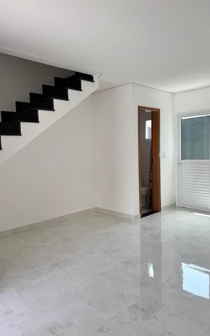 Casa à venda com 56m², 2 quartos e 1 vagaSala/Cozinha