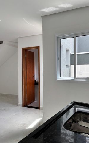 Casa à venda com 56m², 2 quartos e 1 vagaSala/Cozinha