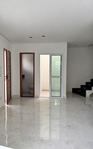 Casa à venda com 72m², 2 quartos e 2 vagasSala