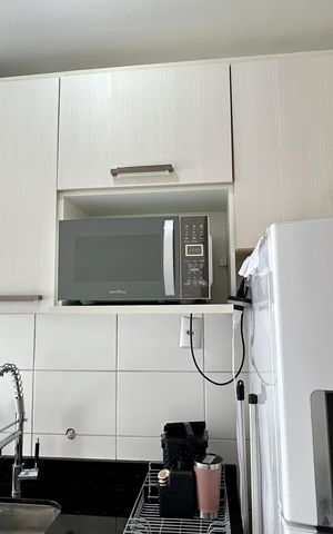 Apartamento à venda com 48m², 2 quartos e 1 vaga Apartamento à venda com 48m², 2 quartos e 1 vagaCozinha