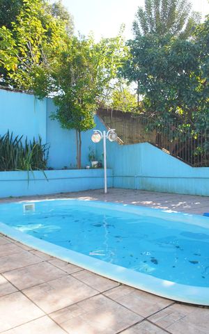 Casa à venda com 200m², 4 quartos e 2 vagasPiscina