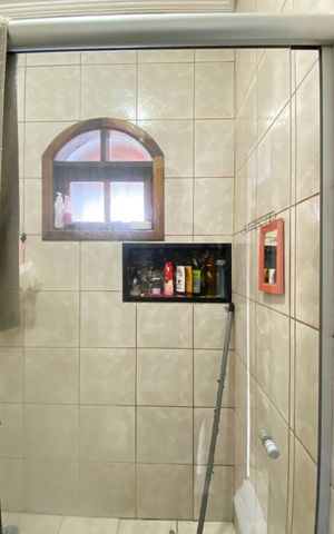 Casa à venda com 190m², 3 quartos e 2 vagas Casa à venda com 190m², 3 quartos e 2 vagasBanheiro da Suíte