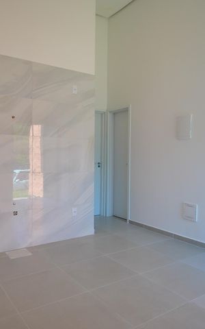 Casa à venda com 57m², 3 quartos e 2 vagasSala/Cozinha