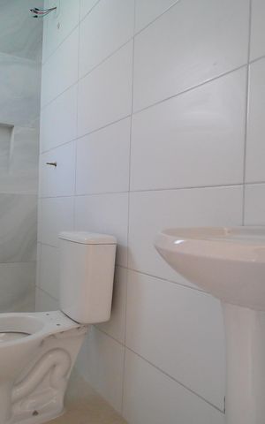 Casa à venda com 57m², 3 quartos e 2 vagasBanheiro