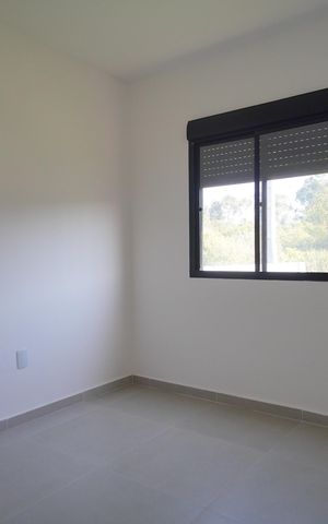 Casa à venda com 57m², 3 quartos e 2 vagasSuíte