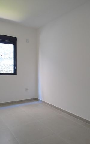 Casa à venda com 57m², 3 quartos e 2 vagasQuarto 1
