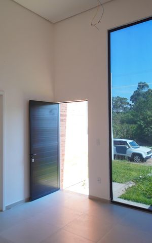 Casa à venda com 57m², 3 quartos e 2 vagasSala/Cozinha