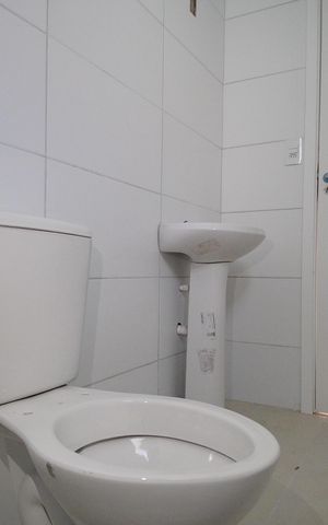 Casa à venda com 57m², 3 quartos e 2 vagasBanheiro