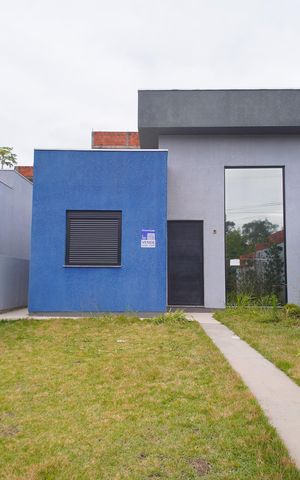 Casa à venda com 58m², 3 quartos e 2 vagasFachada