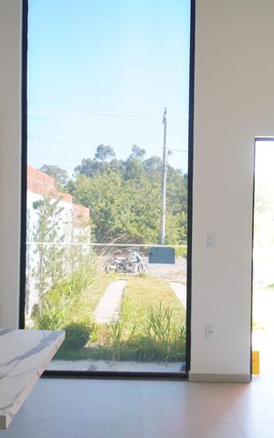 Casa à venda com 58m², 3 quartos e 2 vagasSala/Cozinha