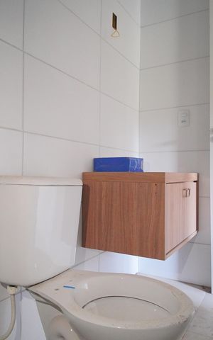 Casa à venda com 58m², 3 quartos e 2 vagasBanheiro da Suíte