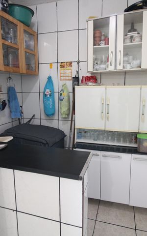 Casa à venda com 200m², 3 quartos e 3 vagasCozinha e Área de Serviço