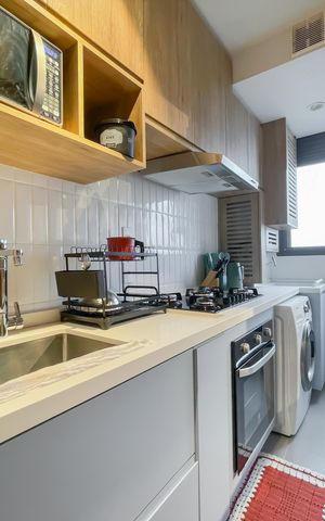 Apartamento à venda com 45m², 2 quartos e 1 vaga Apartamento à venda com 45m², 2 quartos e 1 vagaCozinha e Área de Serviço