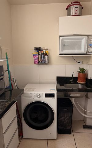 Apartamento à venda com 48m², 2 quartos e 1 vaga Apartamento à venda com 48m², 2 quartos e 1 vagaCozinha e Área de Serviço