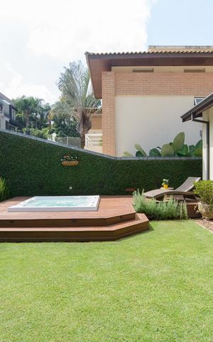 Casa de condomínio à venda com 416m², 4 quartos e 4 vagas Casa de condomínio à venda com 416m², 4 quartos e 4 vagasÁrea externa