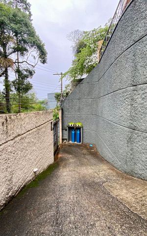 Casa de condomínio à venda com 288m², 4 quartos e 3 vagas Casa de condomínio à venda com 288m², 4 quartos e 3 vagasGaragem