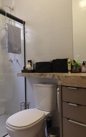 Casa de condomínio para alugar com 160m², 3 quartos e 4 vagasBanheiro da Suíte 2