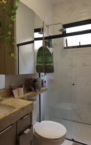 Casa de condomínio para alugar com 160m², 3 quartos e 4 vagasBanheiro da Suíte 1