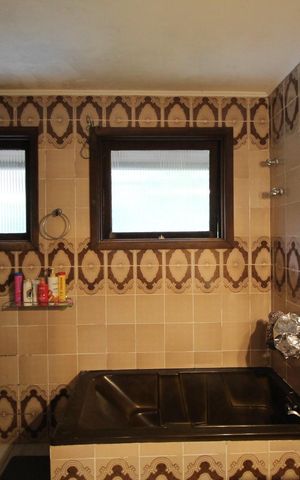 Casa à venda com 388m², 5 quartos e 3 vagasBanheiro da Suíte 1