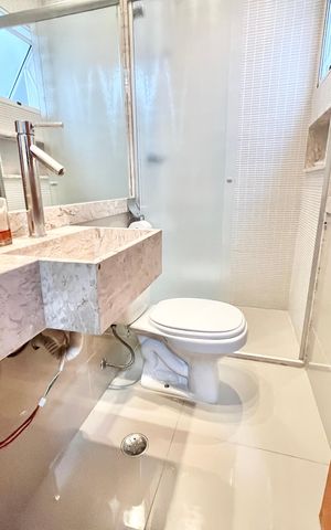 Casa à venda com 120m², 3 quartos e 3 vagasBanheiro da Suíte 2