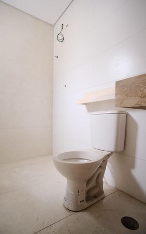 Casa à venda com 115m², 3 quartos e 4 vagasBanheiro da Suíte 2