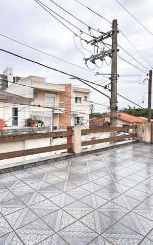 Casa à venda com 250m², 4 quartos e 2 vagas Casa à venda com 250m², 4 quartos e 2 vagasSacada da Suíte 1 e Quarto 2