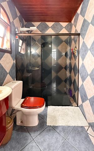 Casa à venda com 250m², 4 quartos e 2 vagas Casa à venda com 250m², 4 quartos e 2 vagasBanheiro da Suíte 3