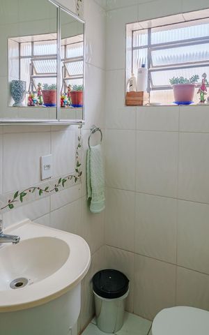 Casa à venda com 150m², 4 quartos e 2 vagas Casa à venda com 150m², 4 quartos e 2 vagasBanheiro da Suíte 1